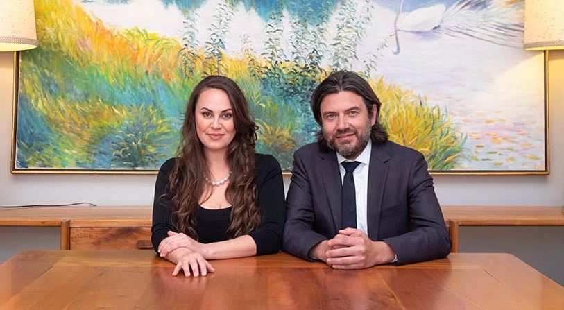 Photo of Attorneys Michelle M. Maloney & Christopher T. Hernandez